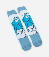 Medias de caña alta celestes con diseño de un Pitufo.