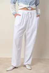 Pantalón italiano de lino azul marino, de corte amplio, con cintura elastizada y cordón ajustable.
