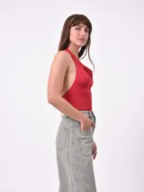 Body negro con cuello halter y espalda descubierta.