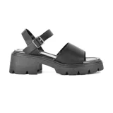 Sandalias negras de cuero sintético con plataforma y hebilla ajustable.