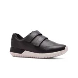Championes de cuero negro con ajuste de velcro y suela blanca.