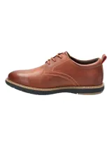 Zapato acordonado de cuero color caramelo, con plantilla hipoalergénica combinada con BLOOM® y suela de Eva con cortes que brindan mayor flexibilidad al caminar.