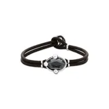 Pulsera de cuero marrón con doble tira y cristal facetado gris en el centro, engarzado en metal plateado.