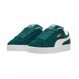 Championes Puma Suede XL, color azul con franja lateral blanca y detalles dorados.