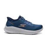 Championes deportivos Skechers Hands Free Slip-ins Go Walk Now - Payton, color azul con logo naranja en el lateral y suela blanca.