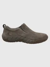 Zapato slip-on de cuero marrón Hush Puppies modelo Tornnado, con suela de goma.