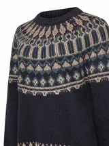 Sweater de lana de alpaca y oveja color crudo con diseño geométrico en tonos marrones.