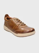Championes de cuero color marrón con cordones, plantilla Smart Foam® y suela de goma.