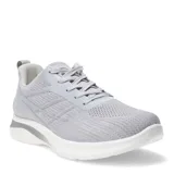 Championes deportivos grises de tela con suela blanca.