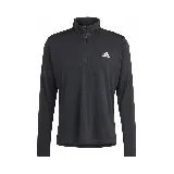 Camiseta de entrenamiento Adidas de manga larga, color negro, con cierre de un cuarto en el cuello y logo blanco en el pecho.