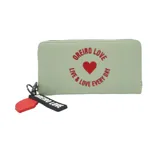 Billetera con cierre de cremallera, color verde agua, con estampa de la marca Las Oreiro en rojo y llavero con logo.