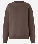 Buzo marrón oversized de algodón con felpa, cuello redondo y rib en bajo y puños.