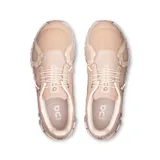 Championes urbanos On Running Cloud 6, color beige con suela blanca.