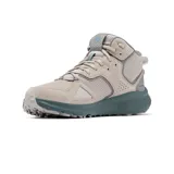 Botas de trekking de media caña Columbia Bethany Mid, color beige con detalles en gris y suela azul.