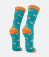 Medias de caña larga, color turquesa, con estampado repetitivo de cabezas de zorro en tonos naranja y marrón. Tienen puño, talón y puntera en color naranja.