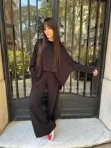 Buzo negro oversize de lanilla con lurex.