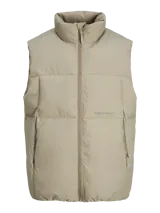 Chaleco acolchado sin mangas color beige, con cuello alto y cierre de cremallera.