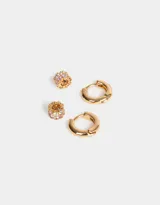 Aros tipo argolla bañados en oro con circonitas cúbicas.