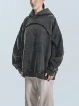 Hoodie unisex color óxido con capucha, corte oversize y bolsillo canguro.