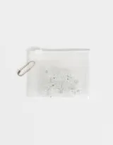 Set de 20 minibroches transparentes en bolsita plástica transparente con cierre.
