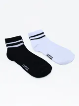Pack de dos pares de medias deportivas cortas, una blanca y otra negra, ambas con tres rayas horizontales en el borde superior y logo de la marca en el lateral.