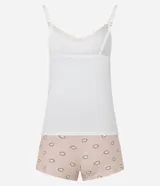 Conjunto de pijama short doll compuesto por un top blanco de rib con breteles finos y detalle de encaje en el escote, y un short rosa con estampado de ojitos y cintura elástica.