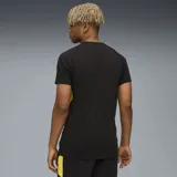 Remera gris de hombre, marca Puma, del Club Atlético Peñarol, con logo de Puma bordado en amarillo y escudo del club estampado en el pecho.