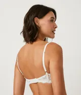 Soutien blanco de encaje floral, sin relleno y con aro.