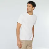 Remera blanca de punto jacquard con cuello redondo y mangas cortas.