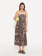 Vestido midi de tirantes finos con estampado animal print.