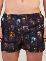 Bóxer de algodón blanco con estampado de flores pequeñas color celeste, con cintura elástica y logo de la marca en el centro.