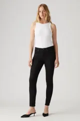Jeans negros ajustados de tiro alto, con denim stretch y tecnología Hypersoft.