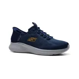 Championes deportivos Skechers Slip-ins Skech Lite Pro Primebase, color azul marino con logo dorado. Capellada de malla con cordones elásticos y plantilla Air-Cooled Memory Foam.
