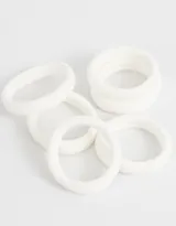 Set de seis gomitas elásticas de toalla lisas en colores negro, gris y blanco.