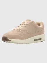 Zapatillas Hush Puppies Brandhall color beige de cuero descarne, con suela de goma EVA con tecnología Air.