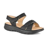 Sandalias bajas color beige con ajuste de velcro en el tobillo y en el empeine.