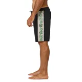 Boardshort de natación negro con cordón ajustable en la cintura. Presenta una franja lateral beige con estampado de flores verdes y un logo en la parte superior.