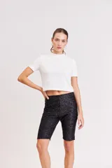 Calza biker negra con lurex plateado.