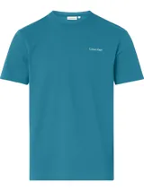 Remera azul petróleo de algodón, con cuello redondo y logo de Calvin Klein bordado en blanco en el pecho.
