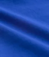 Pantalón de vestir azul eléctrico, de corte recto, con bolsillos laterales y traseros. Se ajusta a la cintura con hebillas laterales.