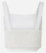 Blusa cropped de sarga color blanco, con escote cuadrado, breteles anchos, lastex en la espalda y detalle cutout debajo del busto.