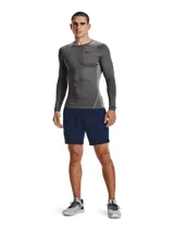 Remera de compresión Under Armour HeatGear Armour de manga larga, color gris jaspeado con detalles en gris liso en hombros y laterales.