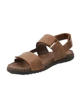 Sandalias marrones de cuero con tiras ajustables con velcro y suela de goma.