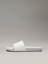 Chancletas blancas Calvin Klein Jeans con logo en relieve en la tira y plantilla texturizada.