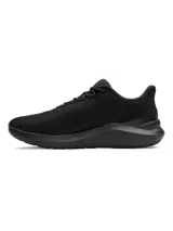 Championes de running Under Armour Phade RN 3, color azul marino con logo verde flúor y suela blanca.