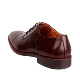 Zapato de vestir Hush Puppies Jazz, color marrón, de cuero, con cordones y suela de goma.