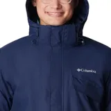 Campera Columbia 3 en 1 color marrón, con capa exterior impermeable y transpirable, y forro polar térmico reflectante.