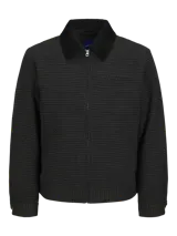 Campera de hombre Jack & Jones, color gris con diseño de pata de gallo, cuello de pana negro, cierre frontal con cremallera, bolsillos laterales y puños abotonados.