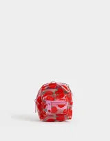 Set de librería que incluye una mini mochila transparente de PVC con estampado de cerezas, un mini cuaderno, un mini bolígrafo de gel y dos planchas de stickers.