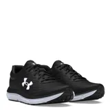 Championes Under Armour Charged Assert 10, color negro con logo blanco en el lateral y suela blanca.